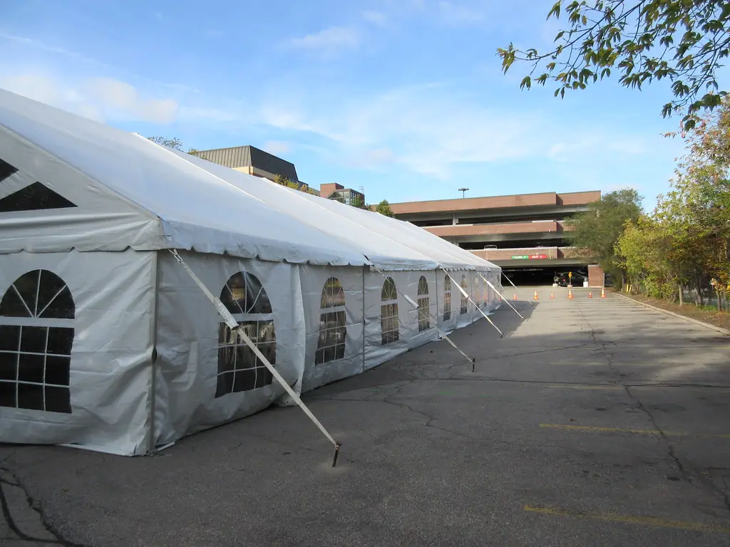 Long frame tent with window sidewalls on a lawn